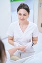 Doctor doing hand massage to a patient Royalty Free Stock Photo