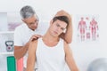 Doctor doing neck adjustment Royalty Free Stock Photo