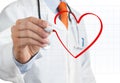 Doctor drawing heart symbol Royalty Free Stock Photo