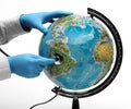 Doctor examine globe Royalty Free Stock Photo