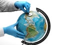 Doctor examine with stetoscope the ill Earth