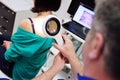 The doctor examines the birthmarks of the patient through a magnifying glass Royalty Free Stock Photo