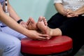 The doctor examines the nerve response with monofilament odiatrist treating feet during procedure. Doctor neurologist examining fe