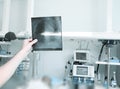 Doctor examines an x-ray picture of the patient Royalty Free Stock Photo