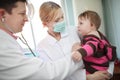 Doctor examining baby Royalty Free Stock Photo