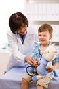 Doctor examining child