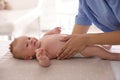 Doctor examining cute baby in clinic, closeup. Health care Royalty Free Stock Photo