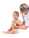 Doctor examining cute baby isolated on white Royalty Free Stock Photo