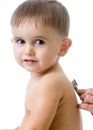 Doctor examining kidy with stethoscope in clinic. Children health concept Royalty Free Stock Photo