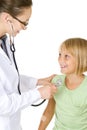 Doctor examining little child girl Royalty Free Stock Photo