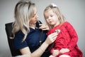 Doctor examining a little girl by stethoscope Royalty Free Stock Photo