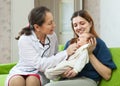 Doctor examining newborn baby Royalty Free Stock Photo