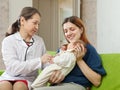 Doctor examining newborn baby Royalty Free Stock Photo