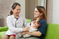 Doctor examining newborn baby Royalty Free Stock Photo