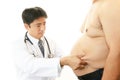 Doctor examining a patient obesity Royalty Free Stock Photo