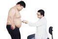 Doctor examining a patient obesity 2 Royalty Free Stock Photo