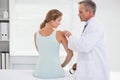 Doctor examining a patients shoulder Royalty Free Stock Photo