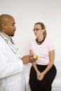 Doctor explaining medication to patient. Royalty Free Stock Photo