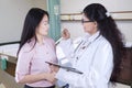 Doctor explaining medicine to her patient Royalty Free Stock Photo