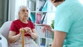 Doctor Explains Health Instructions To Elderly Woman