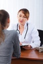 Doctor with female patient