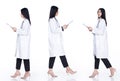 Doctor Female stands holding files and turns walk full length