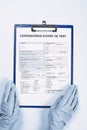 Doctor filling medical form for coronavirus test