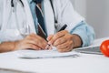 Doctor fills in data taking into account patient`s analyzes. Filling out patient medical history, personal data. Diagnosed