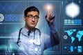 The doctor in futuristic medical concept pressing button Royalty Free Stock Photo