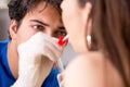 The doctor getting saliva test sample in clinic hospital Royalty Free Stock Photo