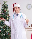 Doctor with gift box in the hospital Royalty Free Stock Photo