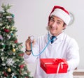 Doctor with gift box in the hospital Royalty Free Stock Photo