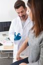 doctor giving female patient injection