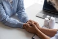 Doctor giving hope. Close up shot of young female physician leaning forward to smiling elderly lady patient holding her Royalty Free Stock Photo