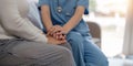 Doctor giving hope. Close up shot of young female physician leaning forward to smiling elderly lady patient holding her Royalty Free Stock Photo