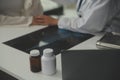 Doctor giving hope. Close up shot of young female physician leaning forward to smiling elderly lady patient holding her hand in Royalty Free Stock Photo