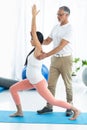 Doctor giving physiotherapy to pregnant woman Royalty Free Stock Photo