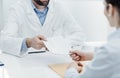 Doctor giving a prescription to a patient Royalty Free Stock Photo