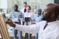 Doctor giving presentation to colleagues at seminar Royalty Free Stock Photo