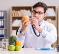 Doctor in GMO food concept Royalty Free Stock Photo