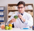 Doctor in GMO food concept Royalty Free Stock Photo