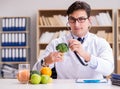 Doctor in GMO food concept Royalty Free Stock Photo