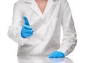 Doctor in gown giving hand in blue glove for handshake Royalty Free Stock Photo