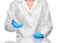 Doctor in gown and gloves holding glass ampoule with drug Royalty Free Stock Photo