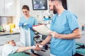 Doctor greeting patient before starting treatment Royalty Free Stock Photo