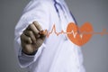 Doctor hand drawing sign wave with red heart, healthy and heart disease concept Royalty Free Stock Photo