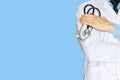 A doctor hand hold stethoscope and arms folded over Royalty Free Stock Photo