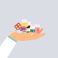 Doctor hand holding different medical pills and bottles. Flat de Royalty Free Stock Photo