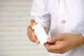 doctor hand holding pill container with copy space Royalty Free Stock Photo