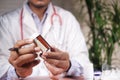 doctor hand holding pill container with copy space Royalty Free Stock Photo